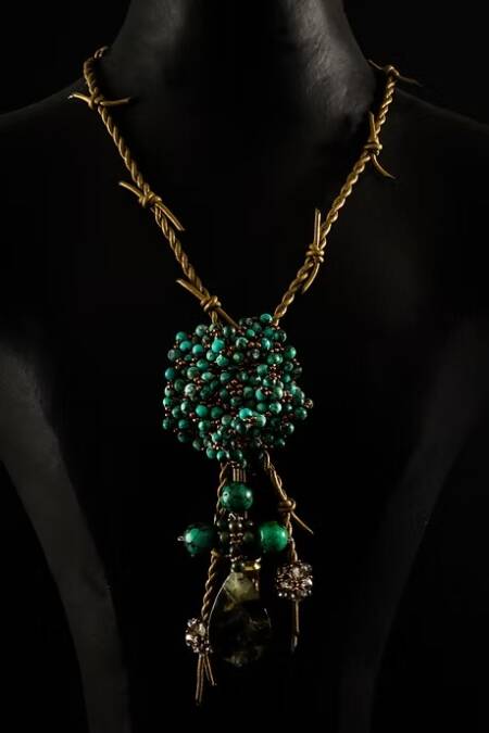 COLLAR FLOR TURQUESAS Y CUERO