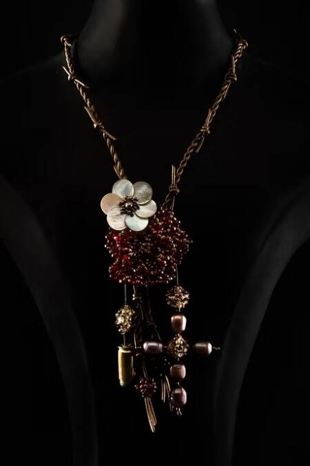 COLLAR NACAR FLOR MARINA Y CUERO